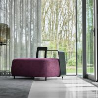 Amarant FR upholstery fabric in interior — 96% polyester / 4% viscose Uni, BS 5852 CRIB 5. Lifestyle view 2.