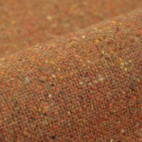 Borana wool-blend upholstery fabric, colour 21: 50% wool / 40% polyacrylic / 10% polyester Uni boucle weave with a Scandinavian natural-fibre look, 140 cm wide, 520 g/m², 50 000 Martindale rubs class SC, light fastness 5 — for sofas, lounge chairs and considered residential interiors.