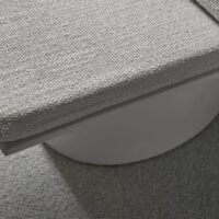 Cassia FR upholstery fabric in interior — recycled olefin / polyester / PAN blend, boucle texture, UV-stable. Lifestyle view 5.
