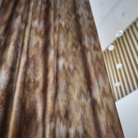 Ceramic decorative fabric in interior — viscose / cotton blend, large-scale pattern. Lifestyle view 5.