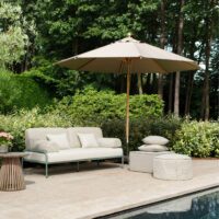 Chive recycled-content upholstery fabric in interior — 94% recycled olefin / 6% polyester, UV-stable, stain-resistant. Lifestyle view 7.