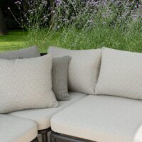 Cilantro recycled-content upholstery fabric in interior — 92% recycled olefin / 8% polyester, fine micro-texture, UV-stable. Lifestyle view 8.