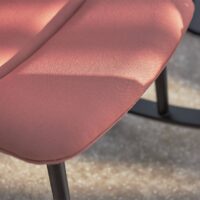 Dita upholstery fabric in interior — 100% recycled olefin Uni, light, UV-stable, stain-resistant. Lifestyle view 2.