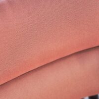 Dita upholstery fabric in interior — 100% recycled olefin Uni, light, UV-stable, stain-resistant. Lifestyle view 3.