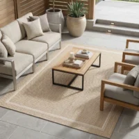 Grano Frame Amber rug in an outdoor lounge area