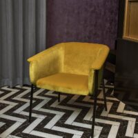 Lapis FR upholstery fabric in interior — 100% polyester FR, lightweight 100 000 Martindale chenille. Lifestyle view 1.