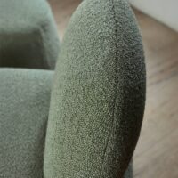 Osmium FR boucle upholstery fabric in interior — acrylic-led, wool-feel, BS 5852 CRIB 5. Lifestyle view 2.