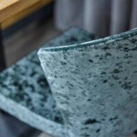 Platinum FR upholstery fabric in interior — 100% polyester Uni FR, 100 000 Martindale heavy contract. Lifestyle view 1.