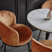 Tour FR multi-purpose acoustic-grade FR fabric in interior — full UK + French + IMO certification stack. Lifestyle view 1.