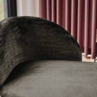 Triana FR striped upholstery fabric in interior — 100% polyester FR, 100 000 Martindale stripes. Lifestyle view 1.